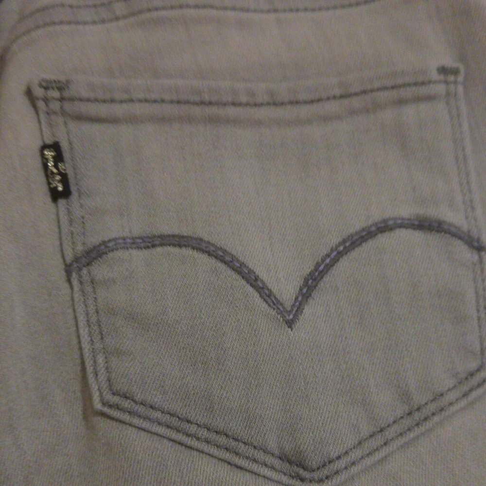 Levi's light gray skinny stretch raw hem cutoff jeans size 27 - Picture 7 of 12